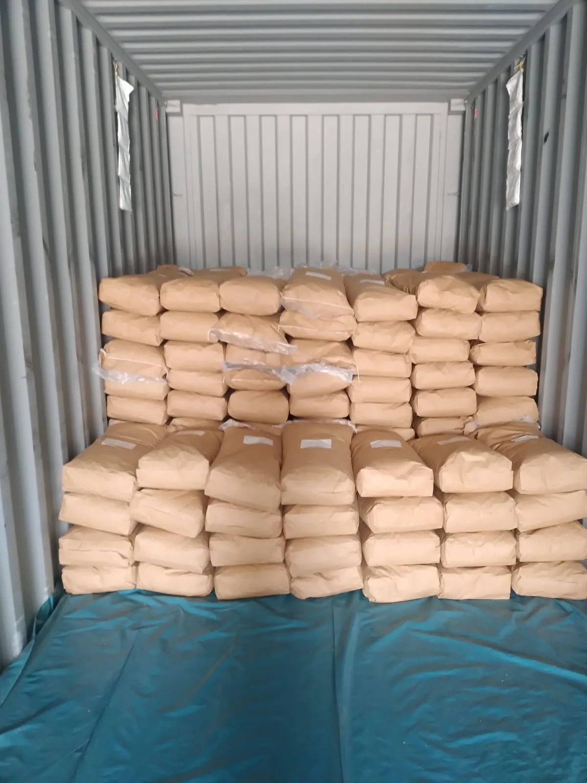 Forklift moving pallets of packaged herbs at Herbs Gate facility